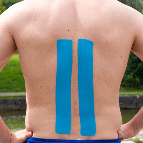 Bandage du bas du dos avec bandes de kinésiologie - instructions